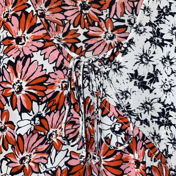 CAbi Seraphina Floral Ruffle Sleeveless Front Tie Top - Picture 4 of 8